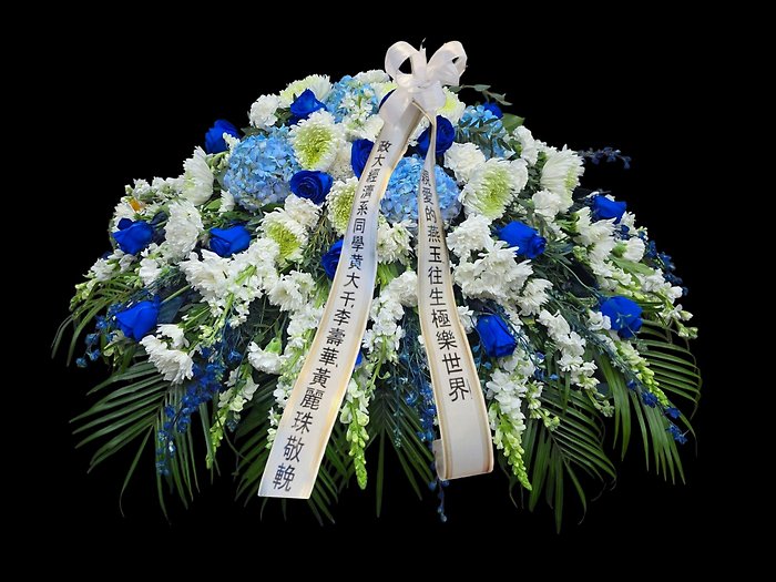 Blue and white casket spray