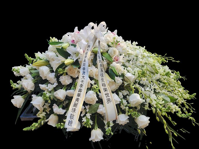 Premium all white assortment casket spray