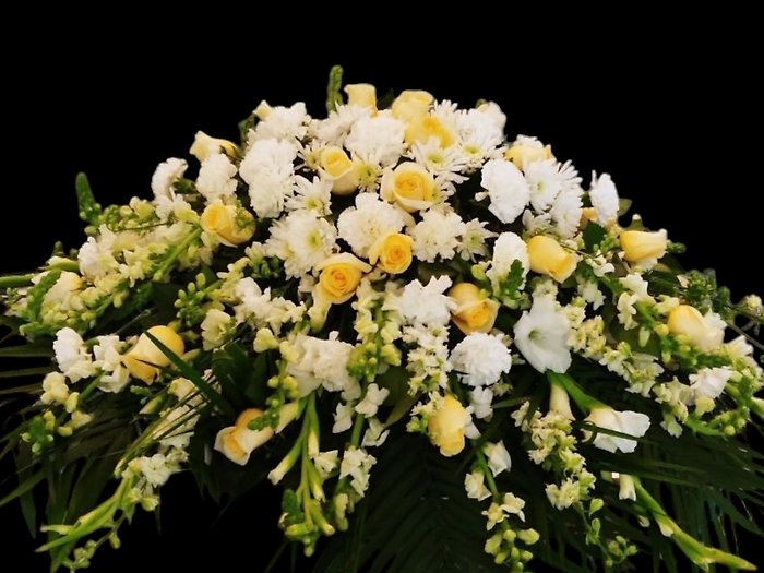 White and Cremé assortment casket spray