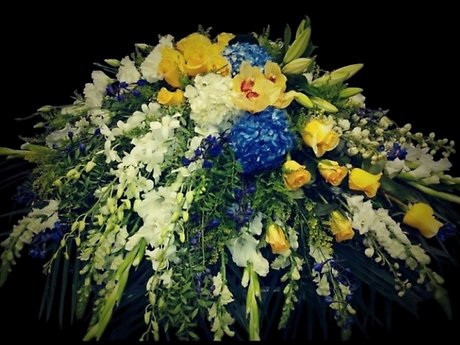 Blues and yellows casket spray